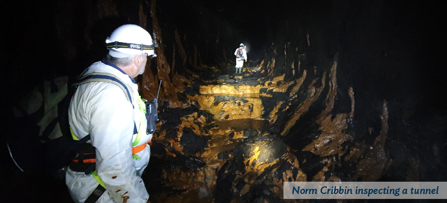 Norm Cribbin conducting an inspection in a tunnel