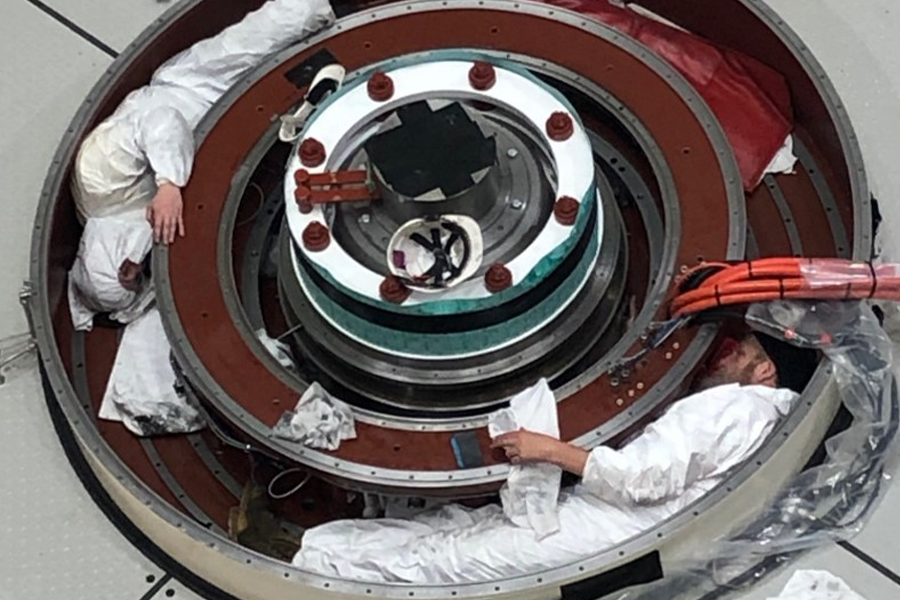 Two workers in the Wilmot Power Station machine turbine