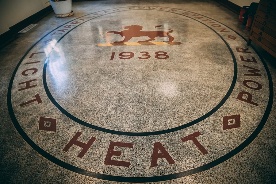 Decorative floor showing Light, Heat, Power and year 1938