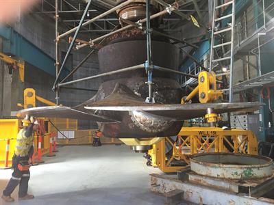 Old turbine covered in rust, oil and dirt