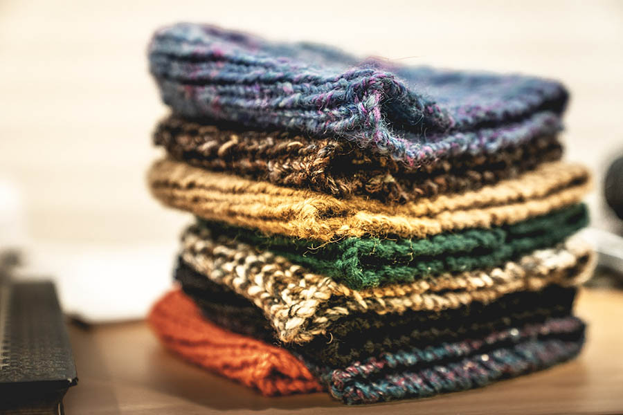Knitted beanies stacked