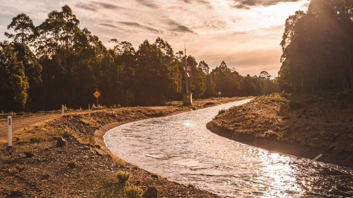 Image of water running along an open canal