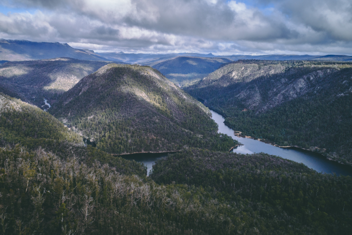 Mountainous terrain with a large river running through a valley