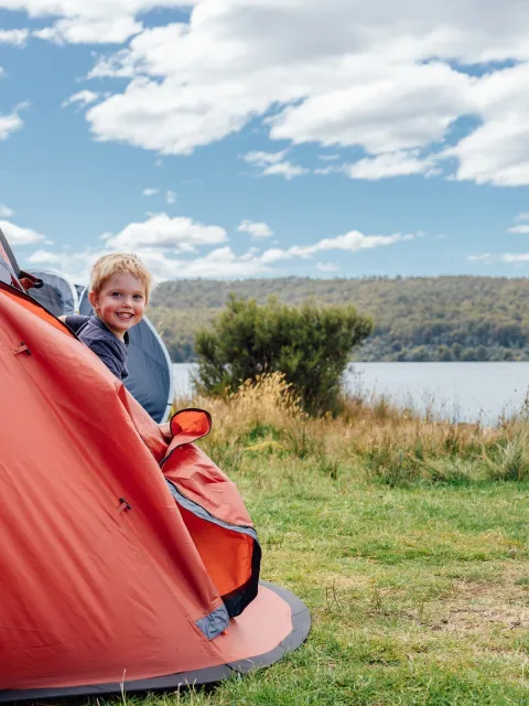 child inside a tent