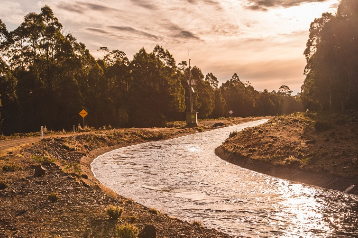 Image of water running along an open canal
