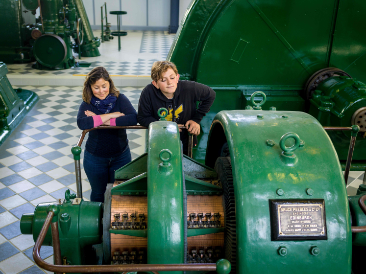 this is a power station with a man standing there