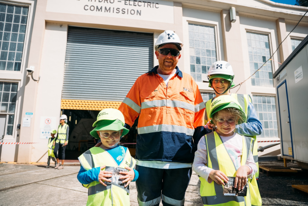 Family in front of Tarraleah Power Station